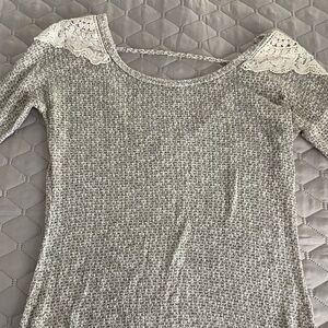 Grey, white and tan with lace trim.